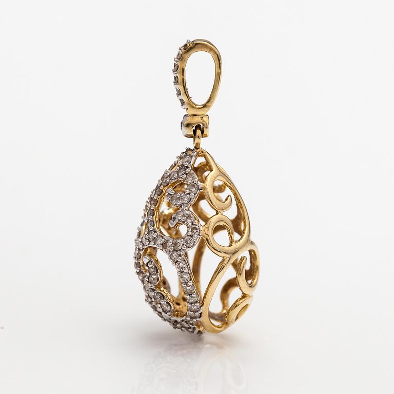 A 14K gold egg-shaped pendant with diamonds ca. 0.53 ct in total. With IGI certificate number.