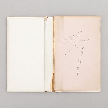 A keepsake book embellished by Ellen Jolin featuring a 'Santa Claus' figure.