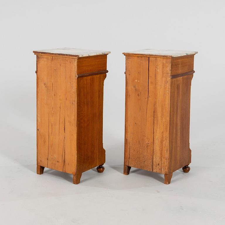 A pair of Neo Renaissance  bedside tables.