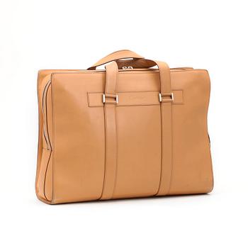 302. CARTIER, a beige leather briefcase.