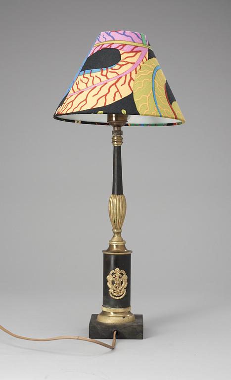 An Empire gilt och patinated bronze table lamp.