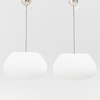 A pair of ceiling lamps, contemporary.