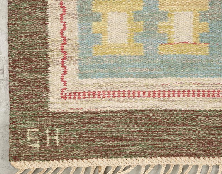 CARPET. Flat weave. 298 x 210 Signed SH.