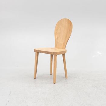 Carl Malmsten, a "skedblad" chair, Tre Sekel, Sweden, 21st century.