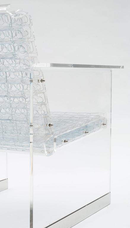 A pair of Arne Rickardt armchairs, 'Pascal', Dux 2002.