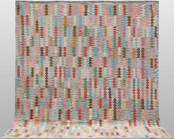 A Kilim rug, approx. 294 x 252 cm.