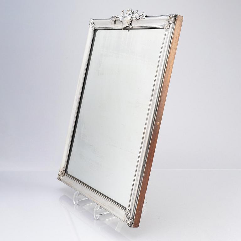 A Swedish Rococo mid-18th century mirror with silver frame  signed by Christian Precht.