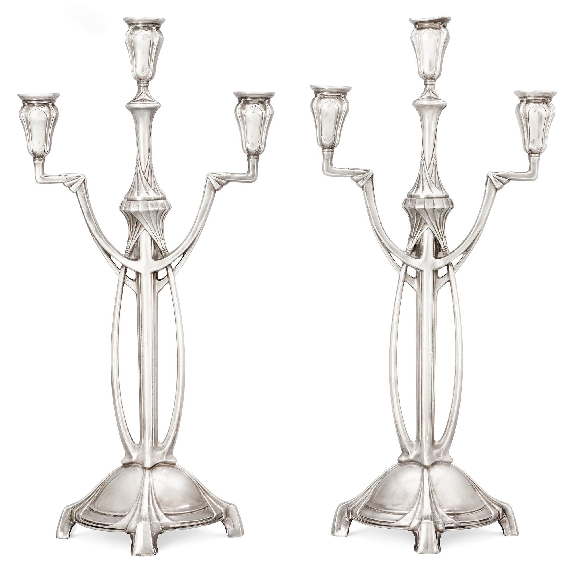 A pair of WMF Art Nouveau silver plated pewter candelabra, Germany.