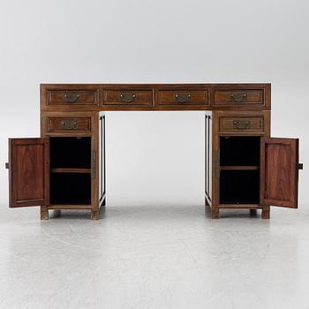 A Chinese hardwood desk, 20th century.