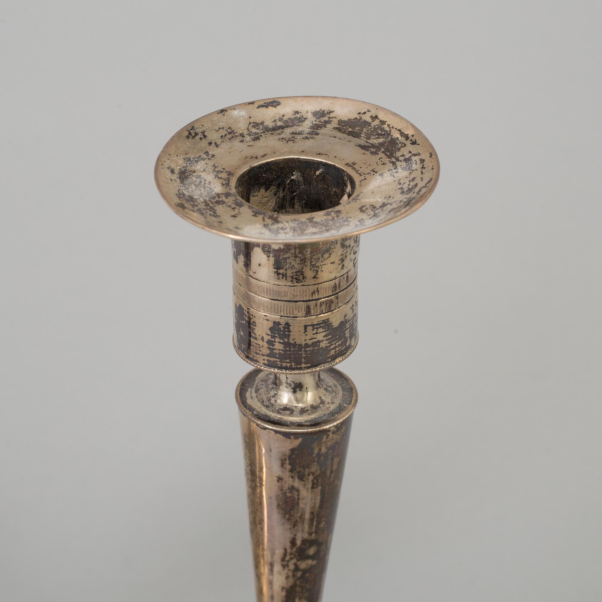 A pair of empire silver candles, presumably Stockholm, dated 1819.