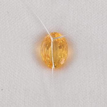 GUL SAFIR, oinfattad, 12.98 ct enligt etui.