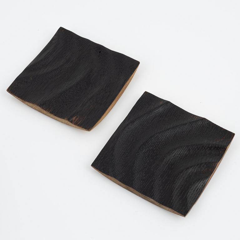 Magnus Ek, a set of eight oak plates for Oaxen Krog.
