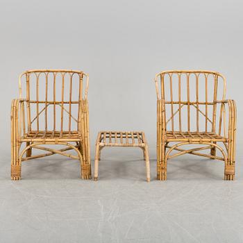 A pair of Garden Armchairs with one stool, mid 20th century.
