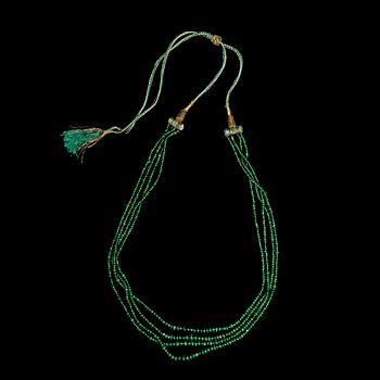 1143. An emerald bead necklace. India.