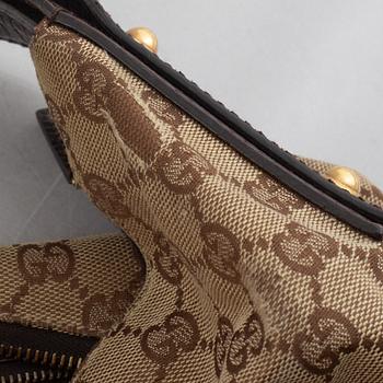 Gucci, a handbag.
