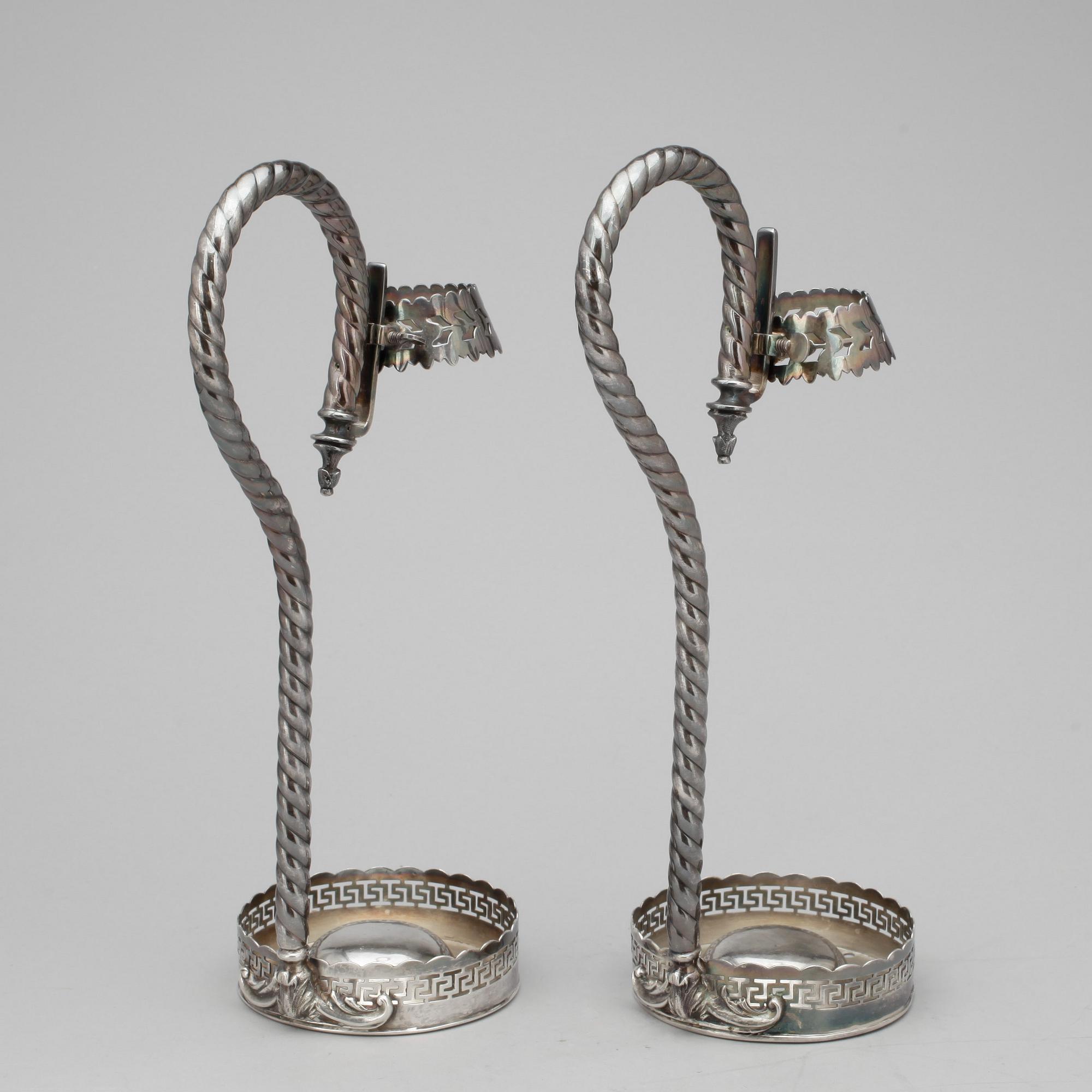 CHAMPAGNEFLASKHÅLLARE, ett par, nysilver, 1900-tal.