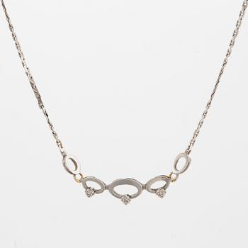 Collier, 18K vitguld med 3 mindre briljantslipade diamanter .