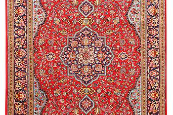 A Kashan carpet, c. 324 x 213 cm.