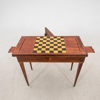 A late Gustavian mahogany game table first half of the 19th century.