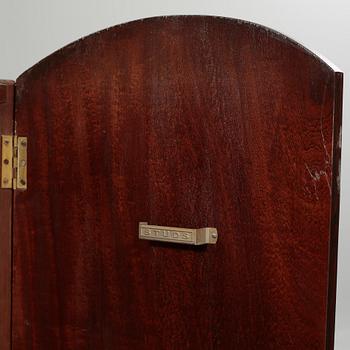 A cabinet from the first half of the 20th century.