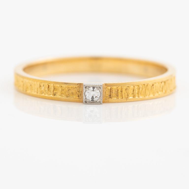 Lapponia ring 18K guld med en åttkantslipad diamant, Finland 1978.