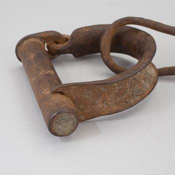 A pair of 1800s handcuffs.