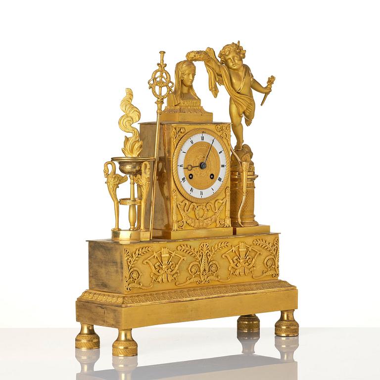 A French Empire ormolu figural mantel clock, early 19th century.