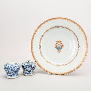 A set of two 19th century blue and white urns and one armorial Qianlong plate.