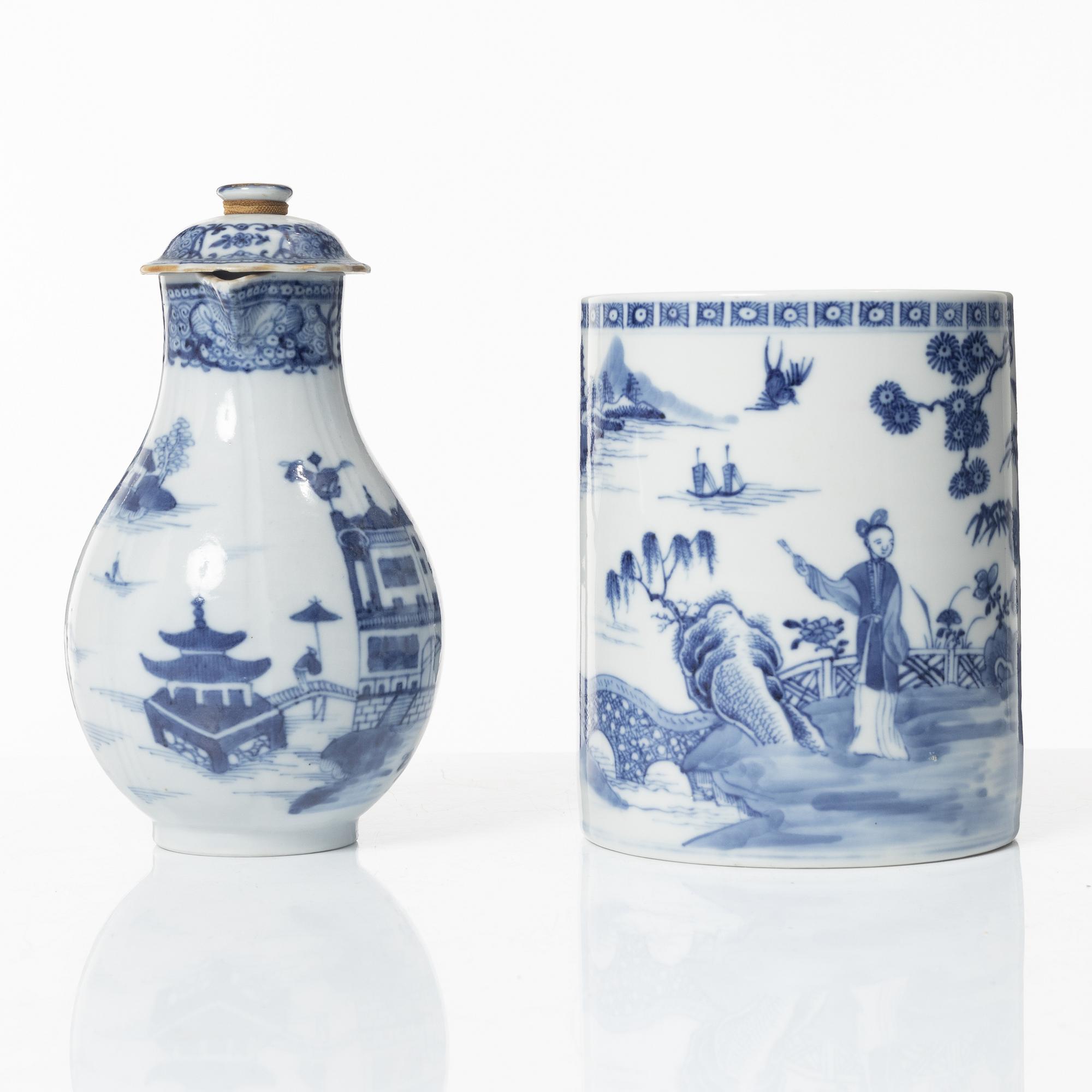 A Chinese blue and white jug, an ewer and three cups, Qing dynasty, Qianlong (1736-95).