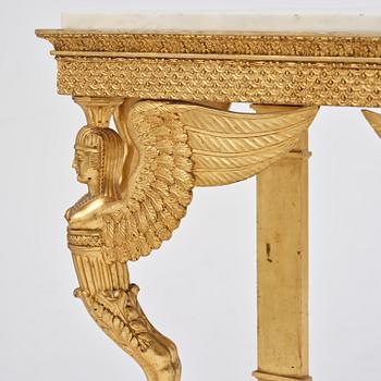 A late Gustavian giltwood console in the manner of J. Frisk, Stockholm, early 19th century.
