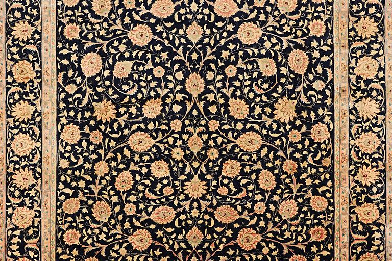 A Meshed carpet, c. 535 x 296 cm.