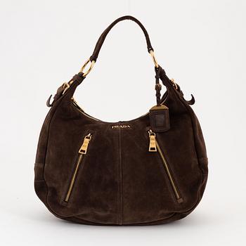 Prada, a brown suede handbag.