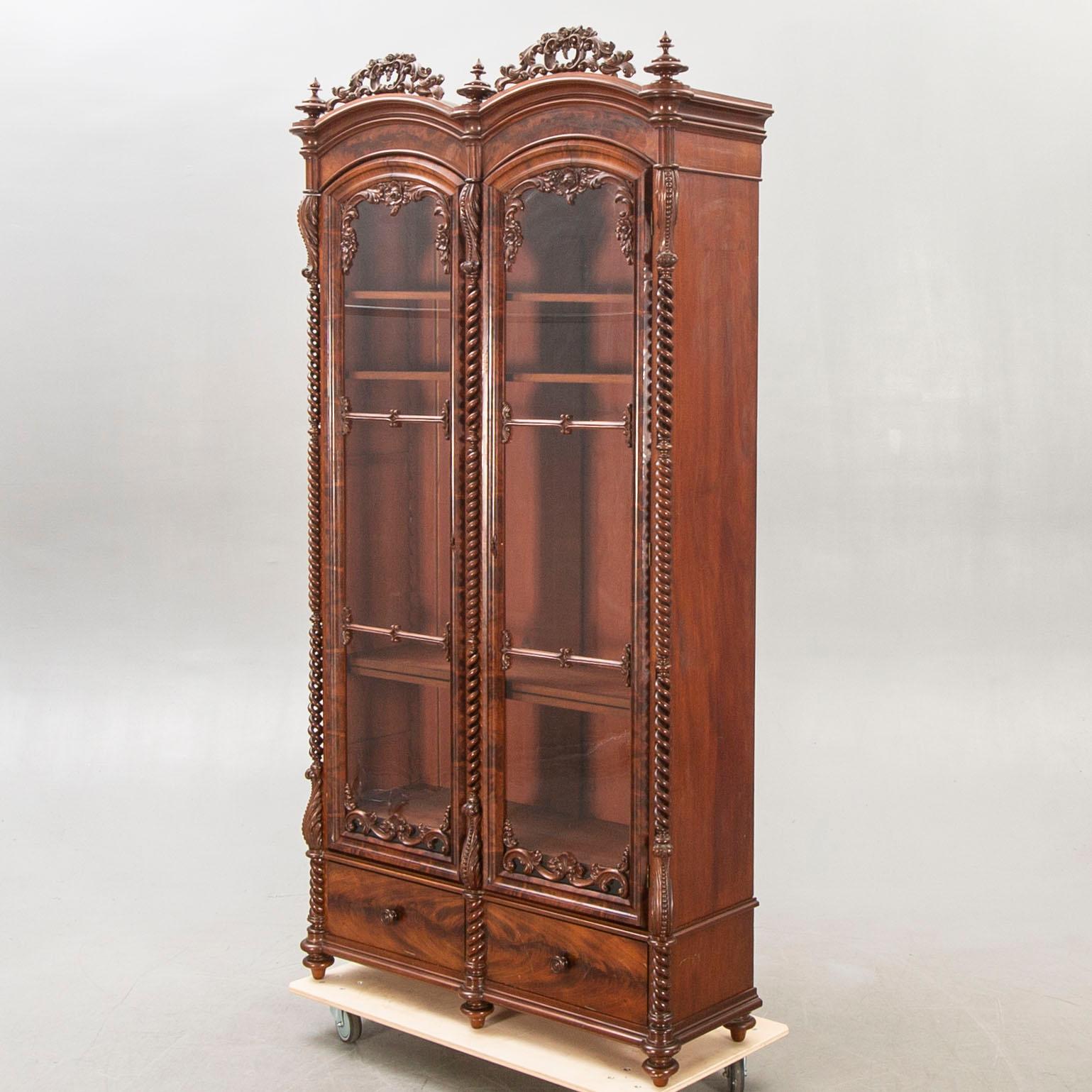 A late Empire mahogany book case.