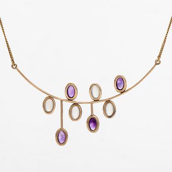 Kaulakoru, 14K kultaa, cabochonhiottu kuukvartsi ja ametisti. Suomalaiset leimat.