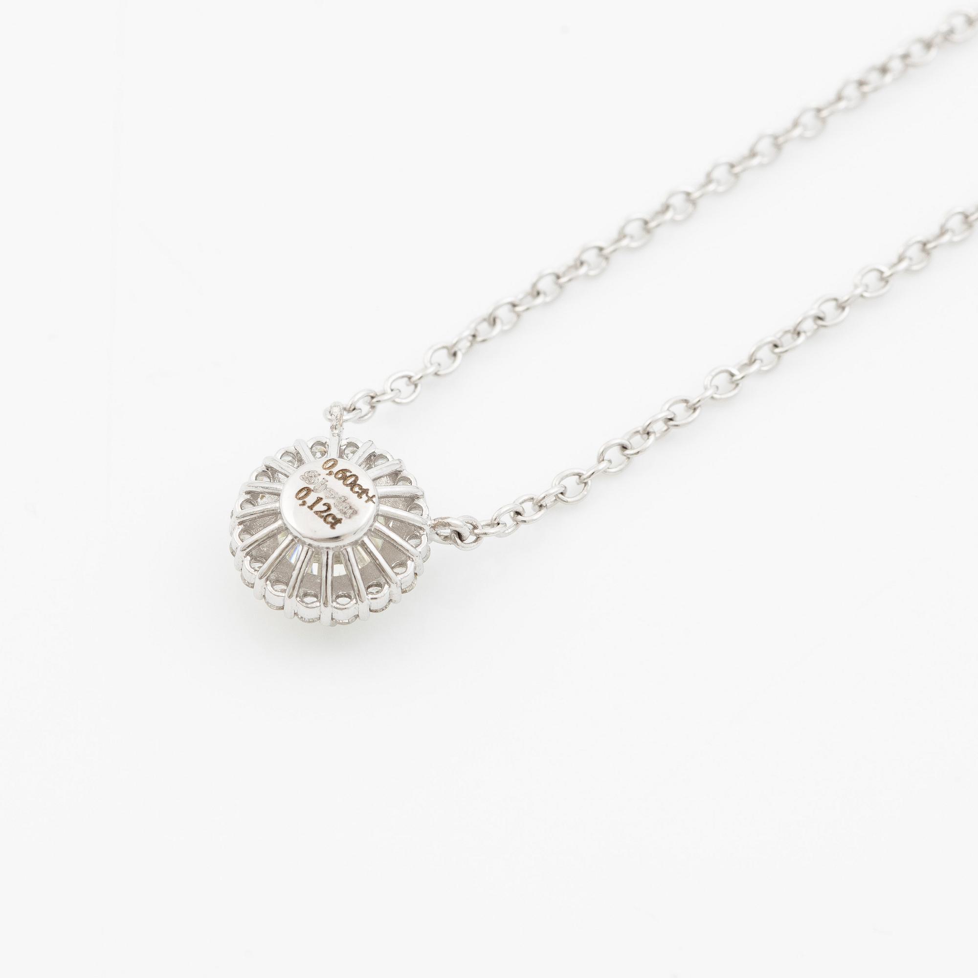 Collier 18K vitguld med briljantslipad diamant.