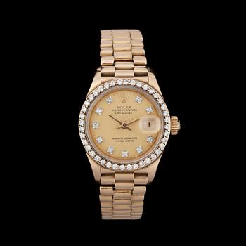 1232. Rolex - Datejust. Automatisk. Guld/guld. Briljantring. 26 mm.