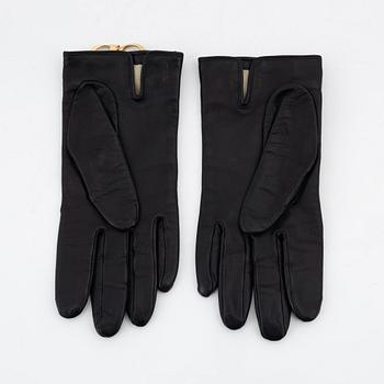 Christian Dior, a pair of leather gloves, size 7 1/2.