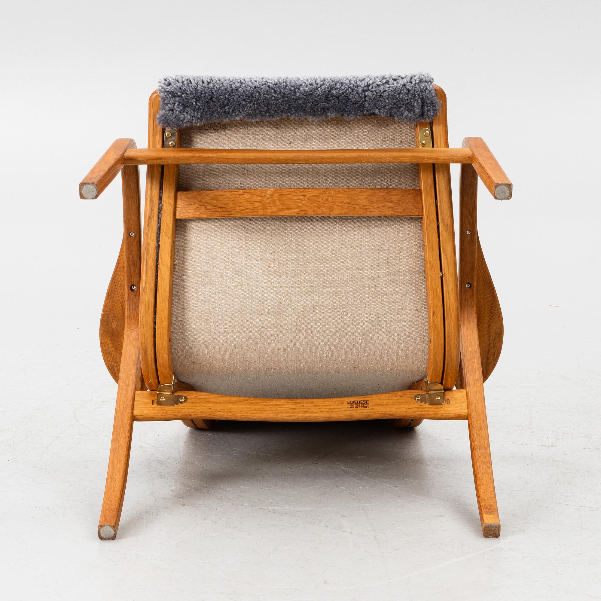 Yngve Ekström, a 'Lamino', armchair, Swedese, 2004.