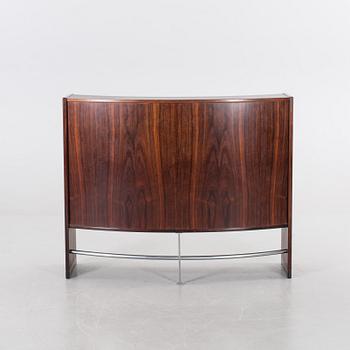 A danish 1960's Smith & Dyrlund bar with three barstools.