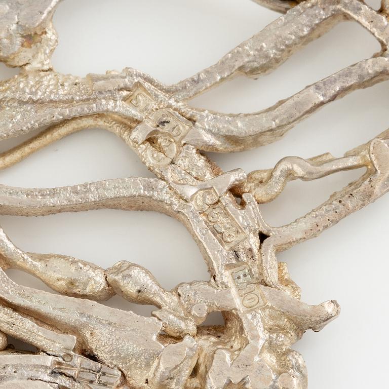 Lars Arby, three neck rings with pendants, silver, Gothenburg including 1977, 1978, and 1982.