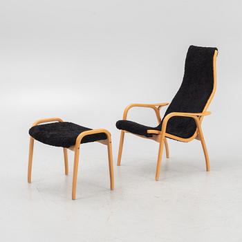 Yngve Ekström, a 'Lamino' easy chair with a foot stool, Swedese.