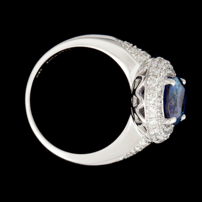 An untreated tanzanite, 3.74 cts, and brilliant cut diamonds, total carat weight circa 1.75 cts, ring.