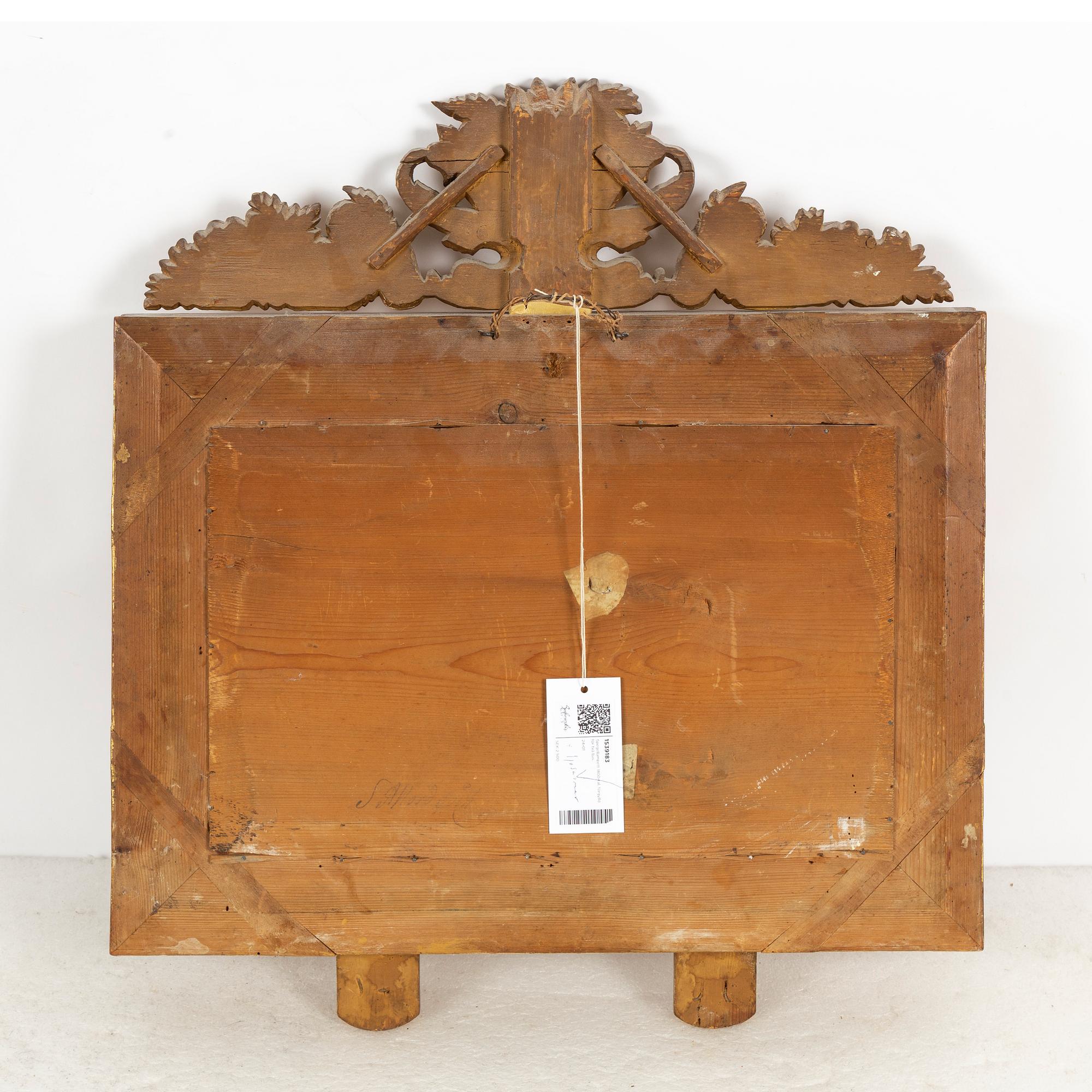A mid 19th century mirror sconce.