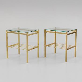 A pair of brass and glass tables, second half of the 20th century.