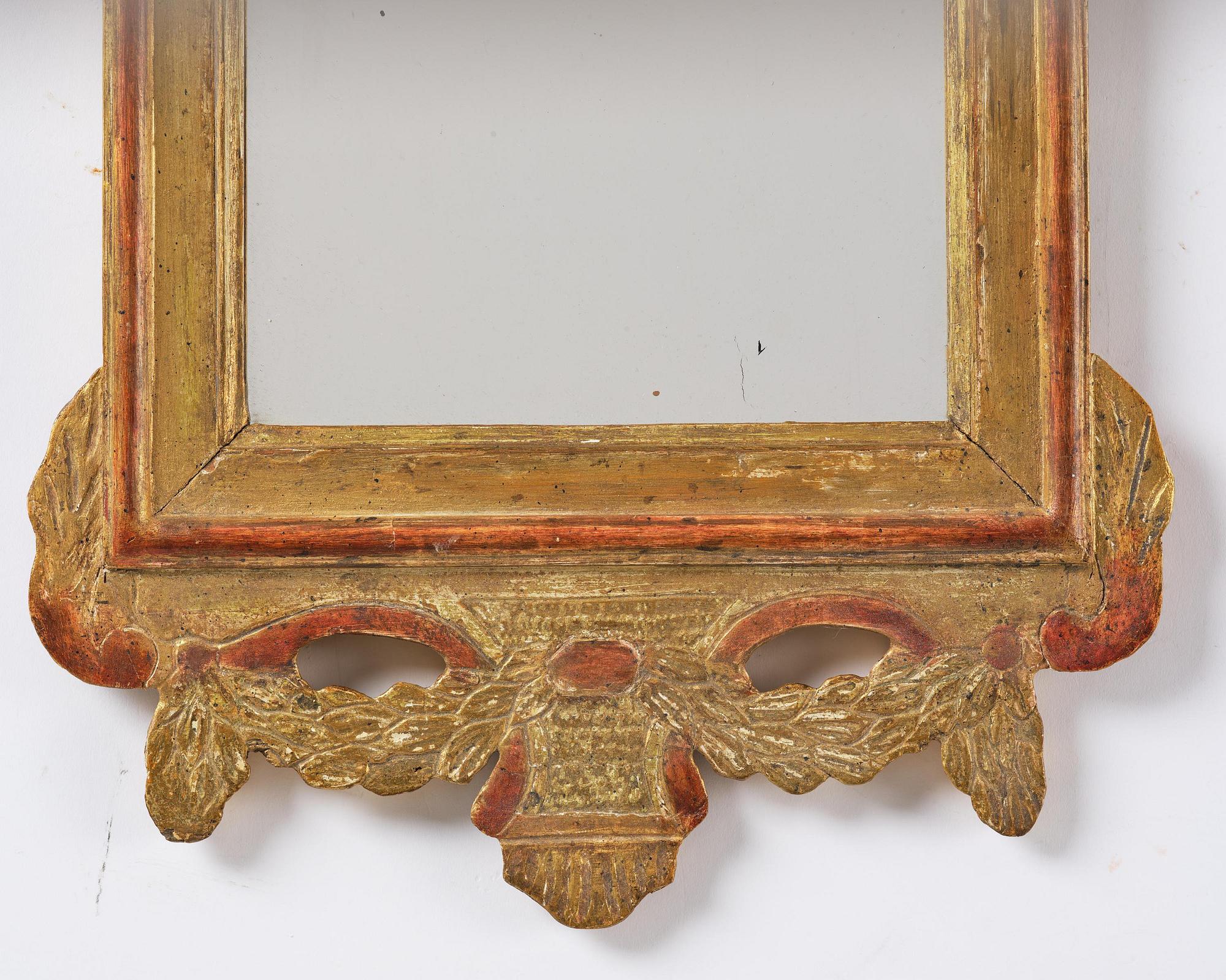 A pair of Gustavian giltwood mirrors by N. Falkengren (master in Jönköping 1776-1813).