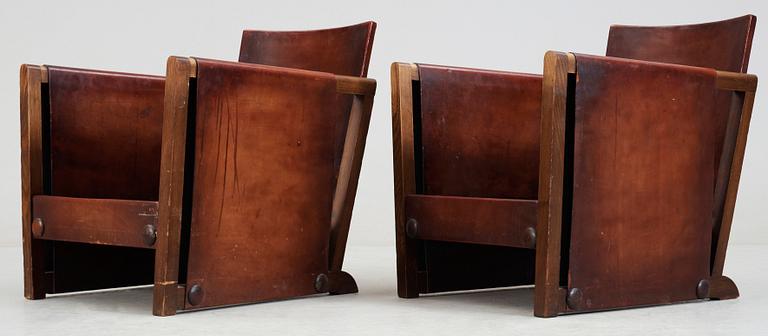 A pair of Axel Einar Hjorth brown leather 'Funkis' armchairs, Nordiska Kompaniet, Sweden ca 1930.
