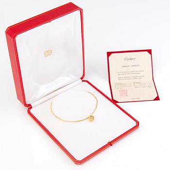 A Cartier 18K gold necklace with heart pendant 1999 and 2001. Certificat and original box.