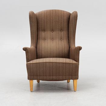 Carl Malmsten, an 'Åldermannen' armchair, second half of the 20th Century.