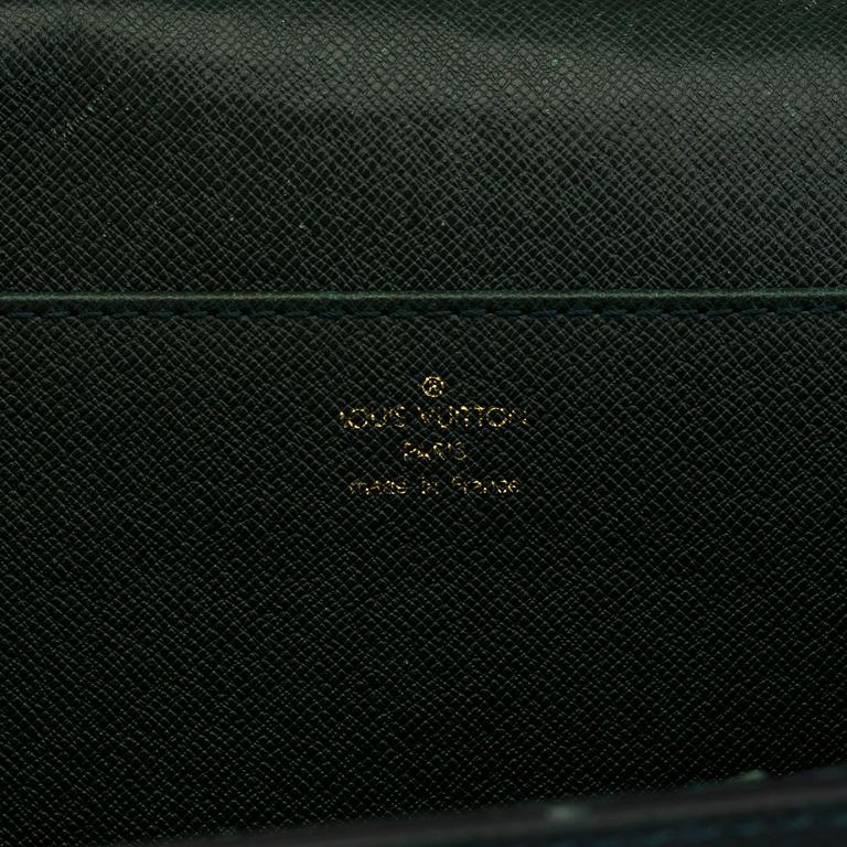 A 'Moskova' taiga leather briefcase from Louis Vuitton.