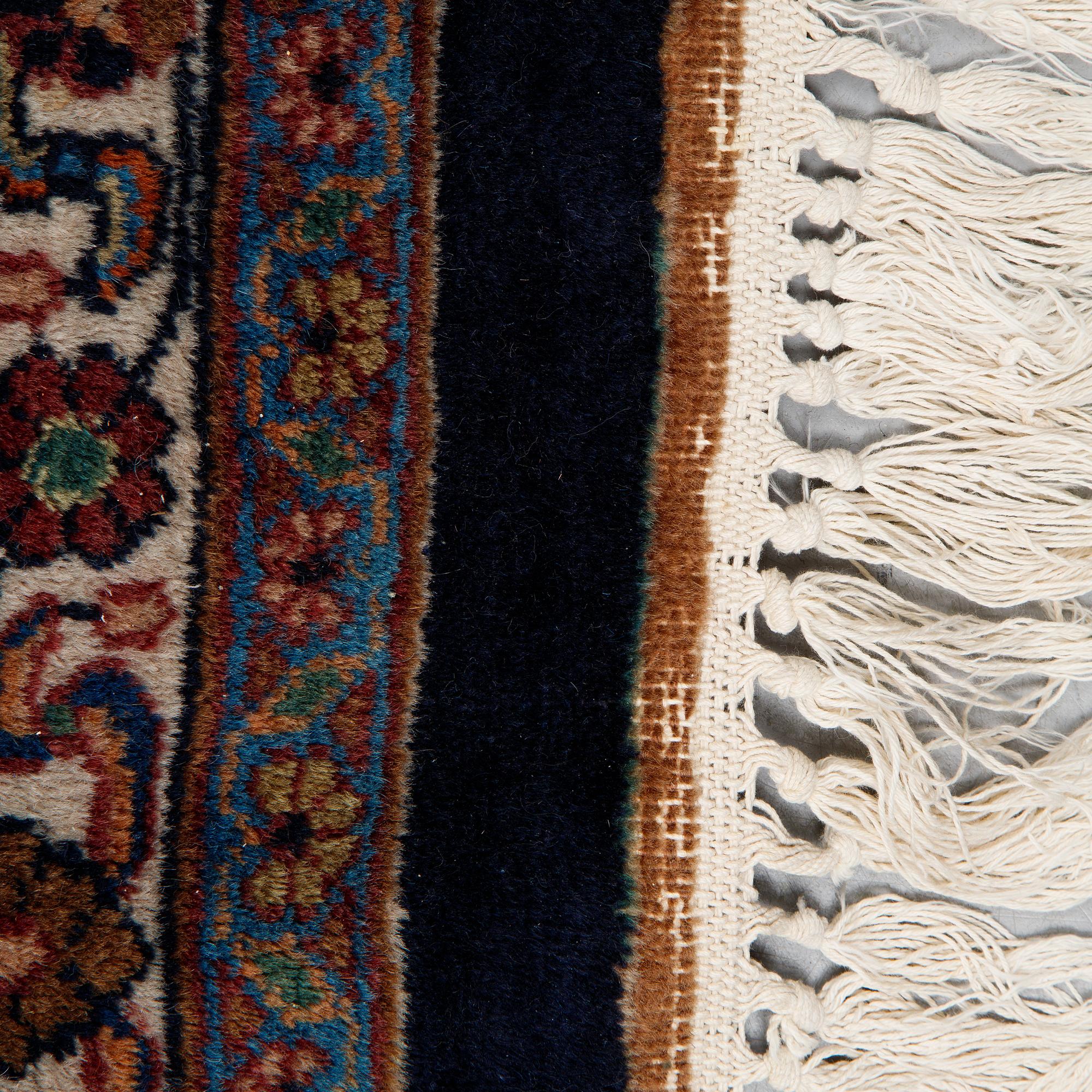 A carpet, Old oriental, ca 347 x 251 cm.